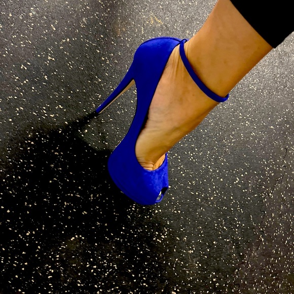 Worn these once or twice. One of the sexiest heels and a beautiful color! - Picture 1 of 9
